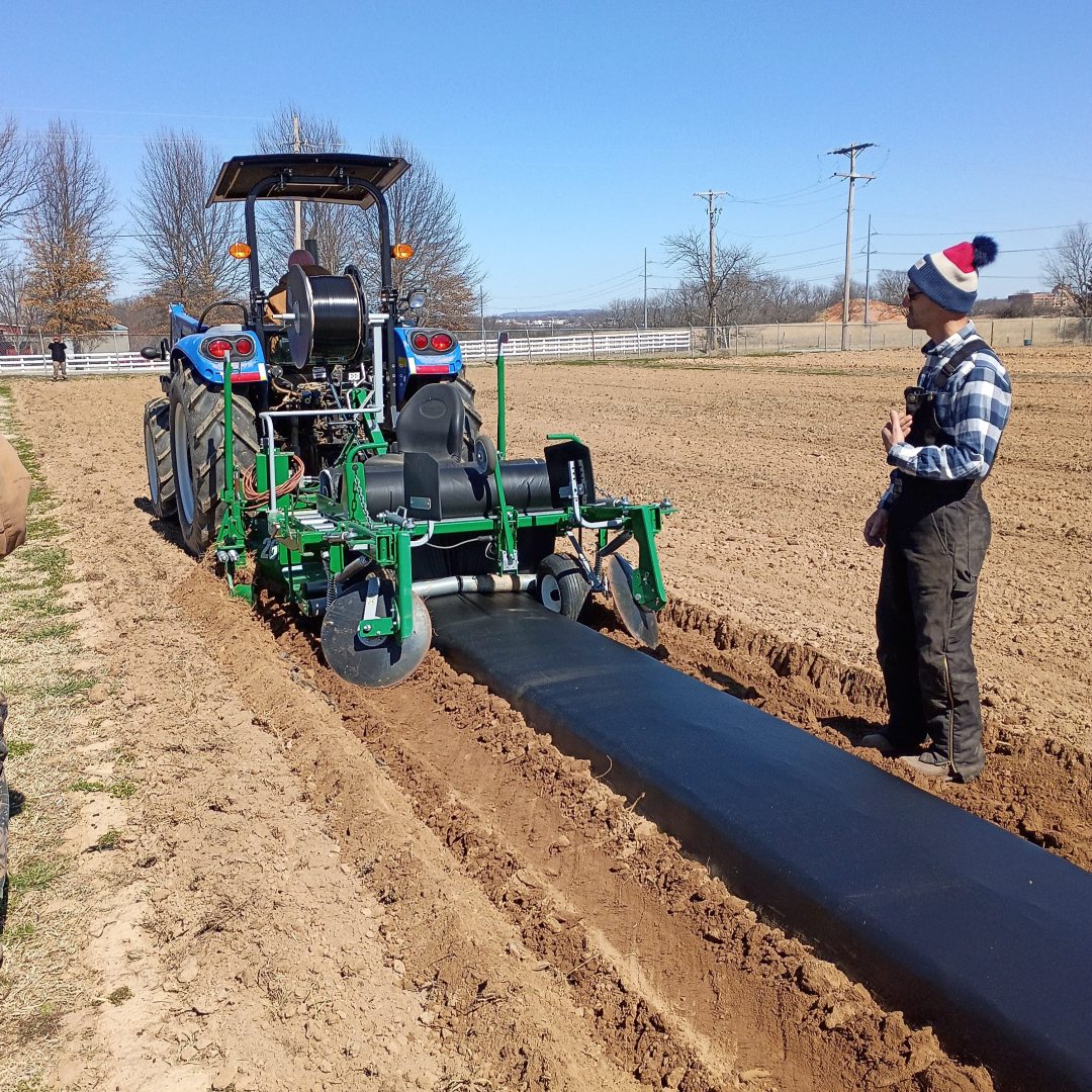 Tractor pulling plastic